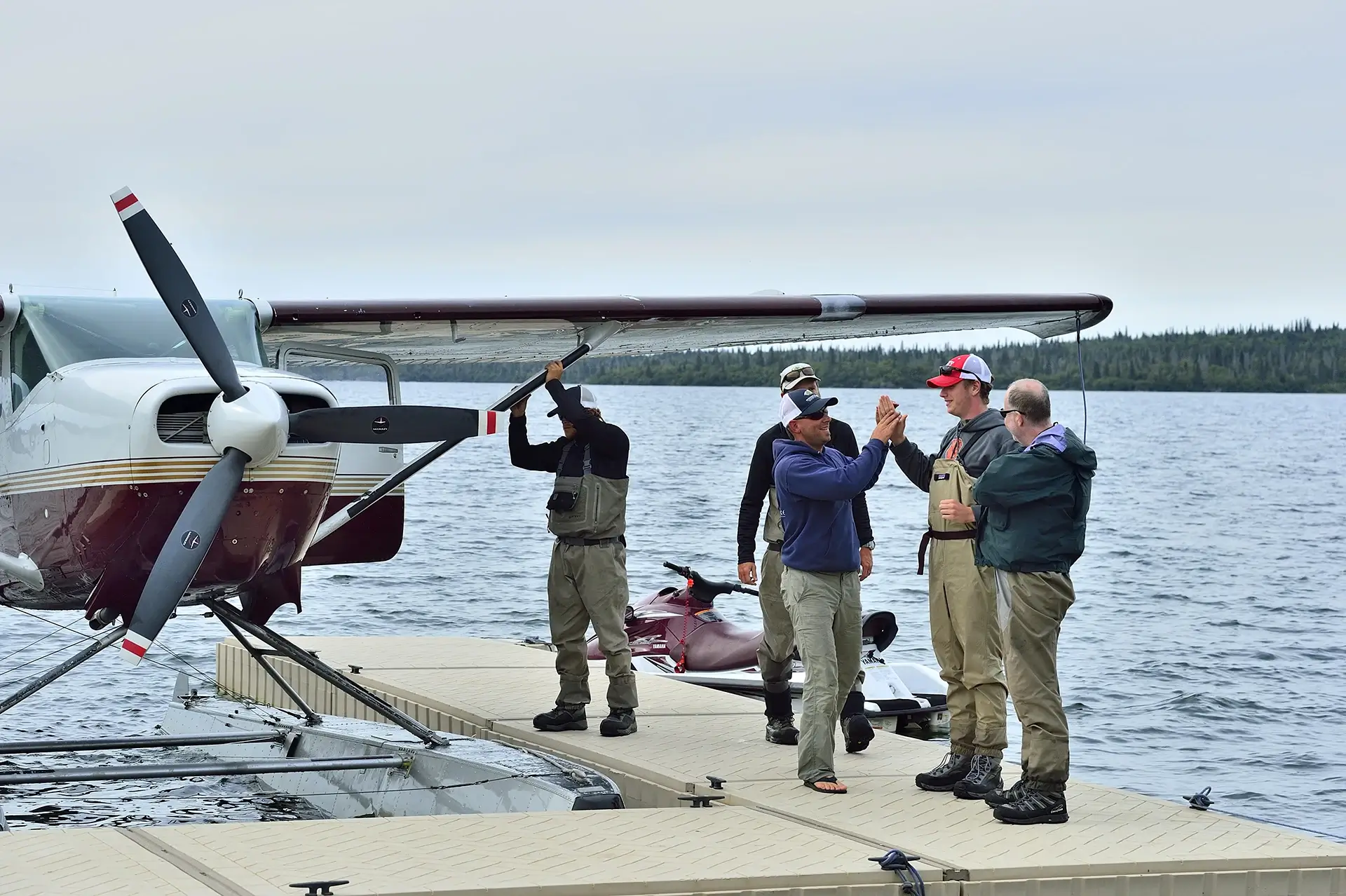 People preparing for a fishing trip - Combo Package - Intricate Bay Lodge