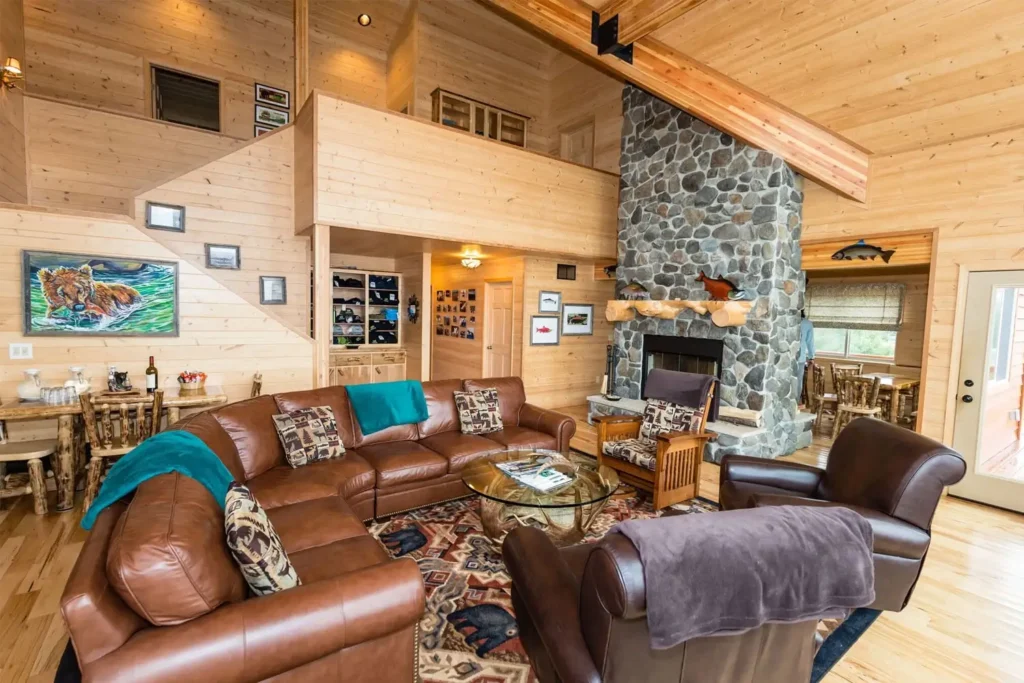 Cozy wooden lodge with stone fireplace - Intricate Bay Lodge